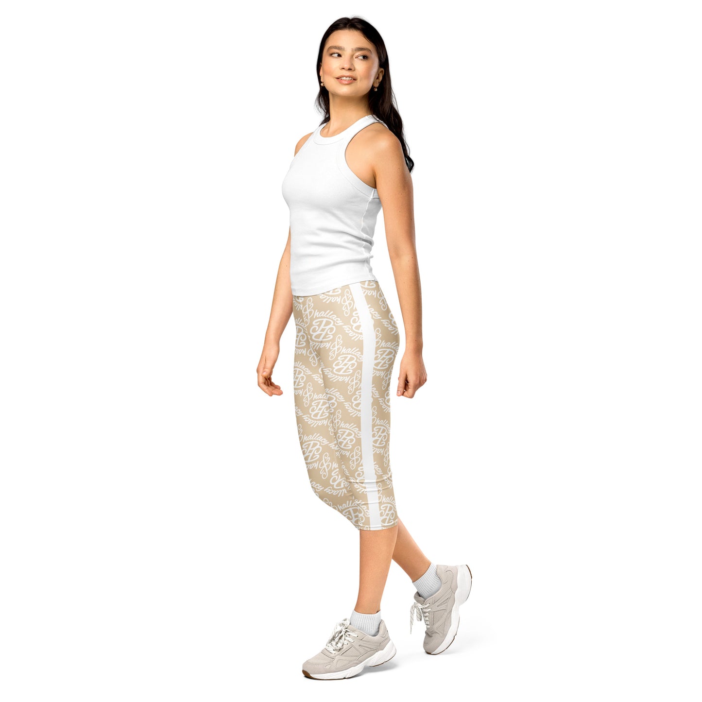 Stylish designer monogram capri leggings in beige, perfect for athleisure and casual wear.