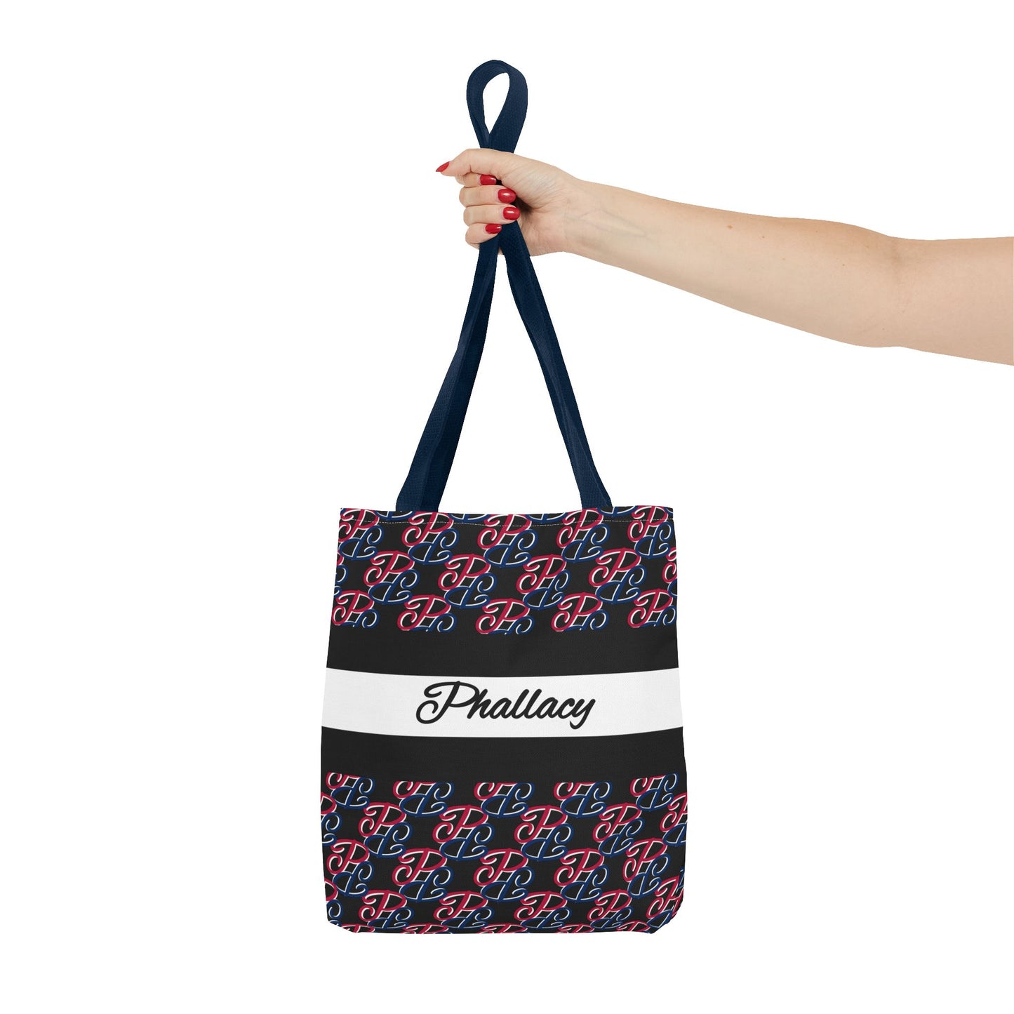 Phallacy designer tote bag with black red and blue pattern and white stripe held by hand