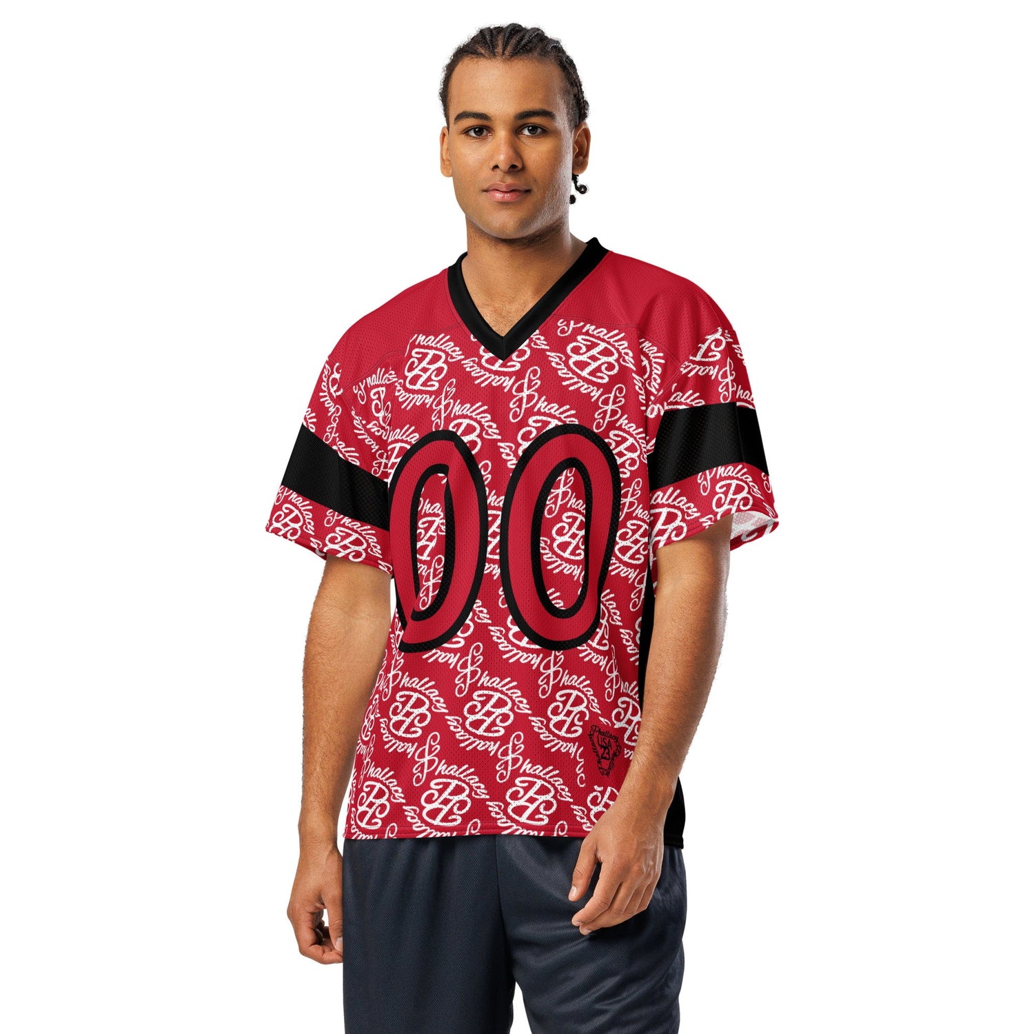 Man wearing a black and white striped designer polo shirt showcasing designer men's fashion online