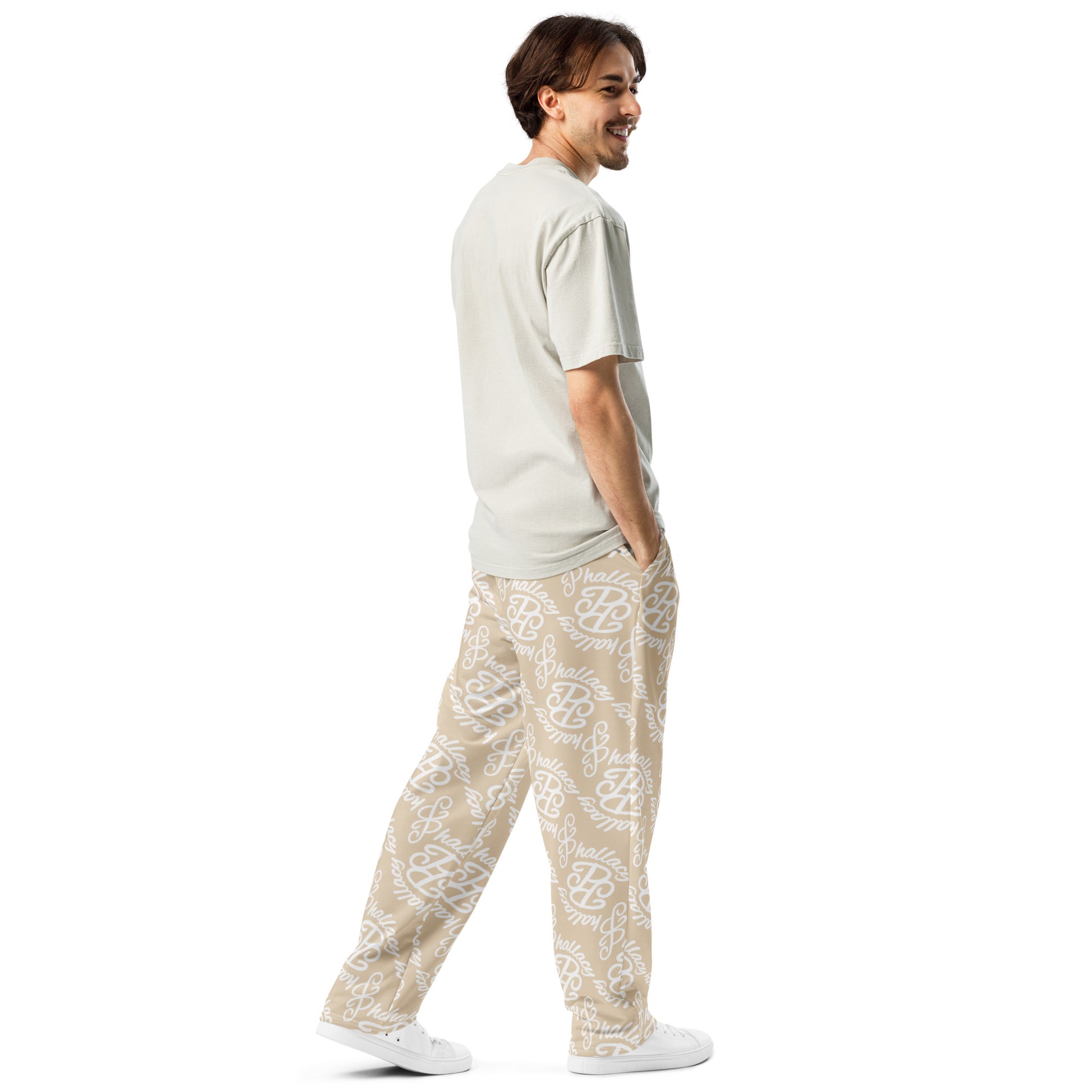 Designer monogram wide-leg joggers in beige with a stylish all over print, perfect for casual wear.