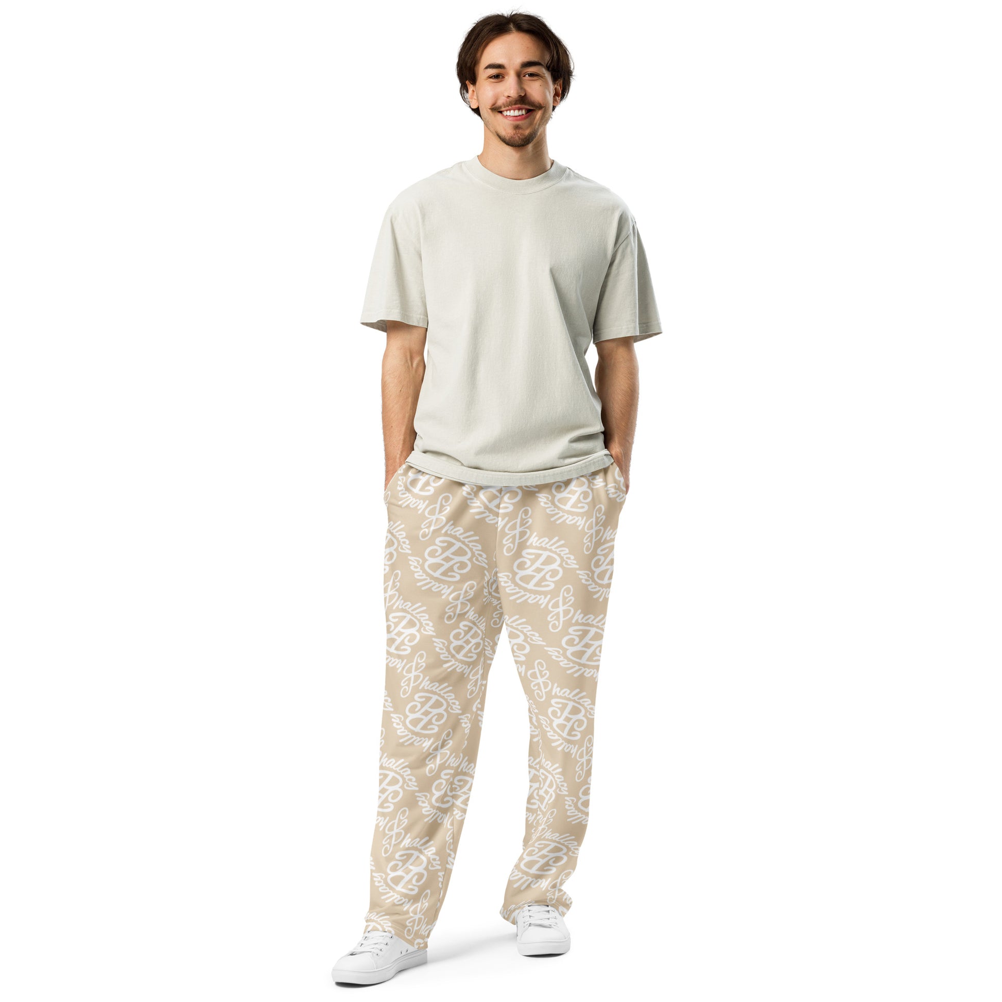 Light beige designer monogram wide-leg joggers with a casual fit and stylish pattern