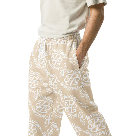 Designer monogram wide-leg joggers in beige with stylish print for comfortable casual wear