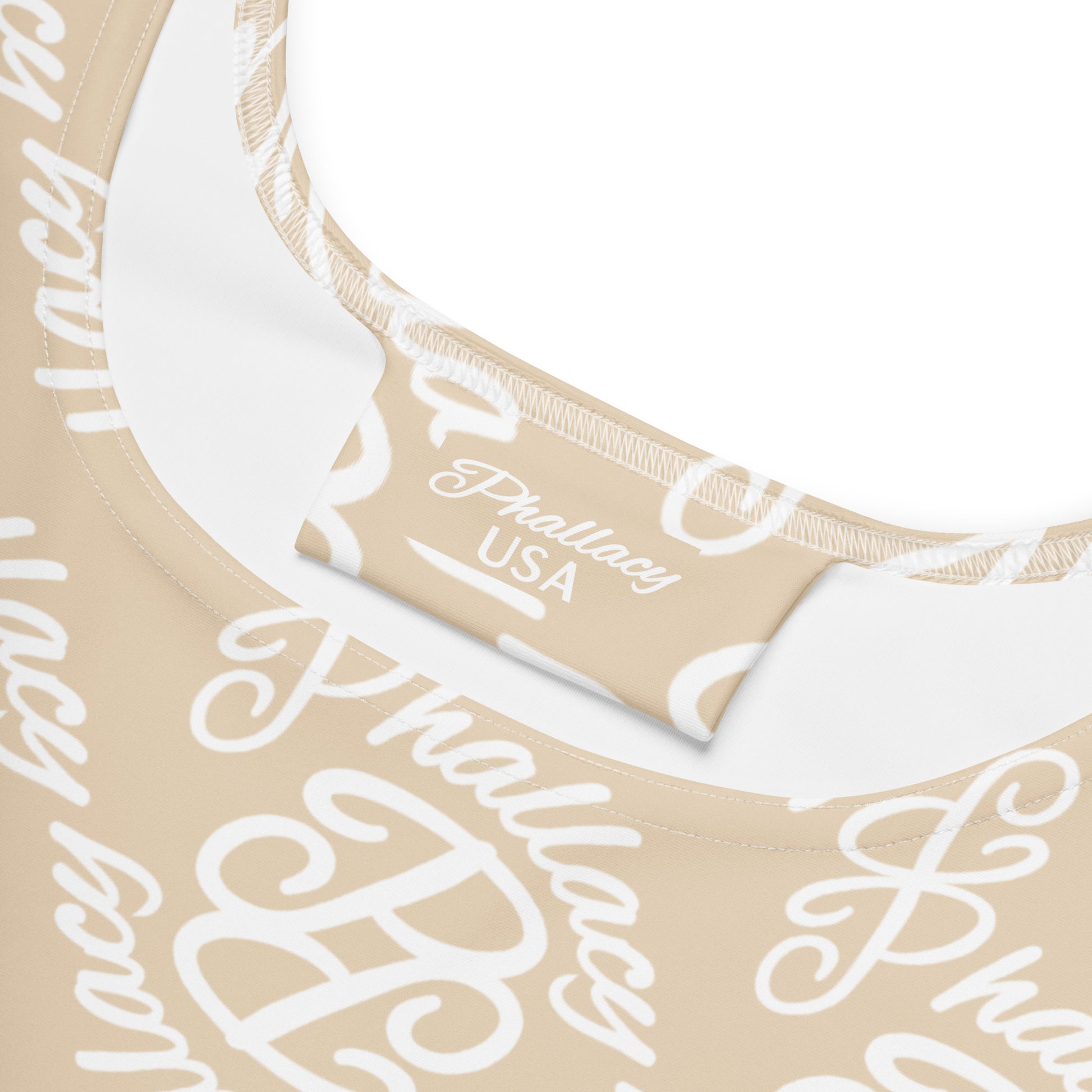 Close-up of beige designer skater dress for women featuring stylish all-over print and comfortable neckline