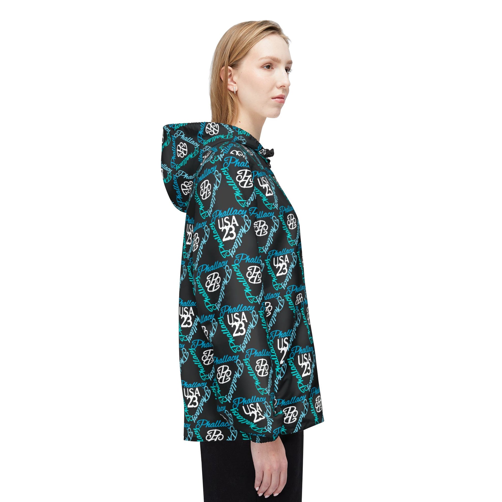 Side view of a designer unisex windbreaker jacket with a black and teal pattern for a stylish look