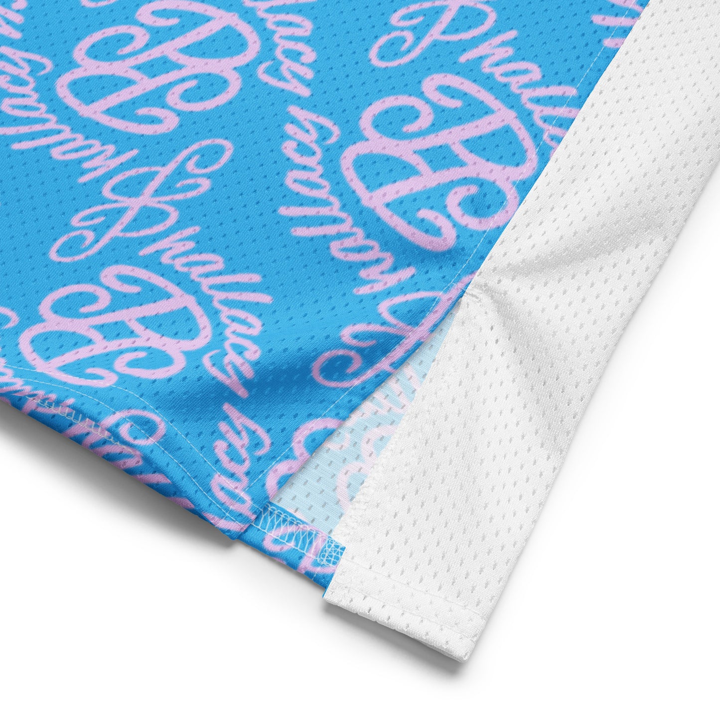 Designer women's football jersey in blue with pink all-over print and breathable fabric