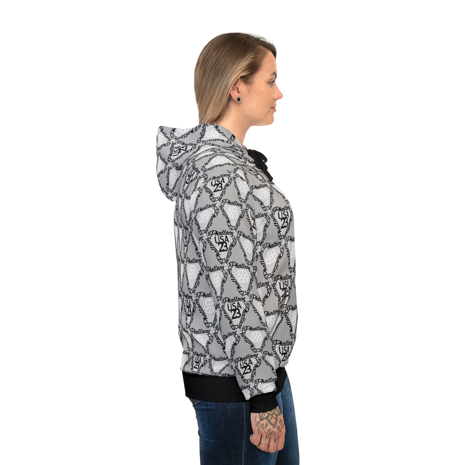 Side view of a luxury streetwear hoodie featuring an all-over print design in black and gray