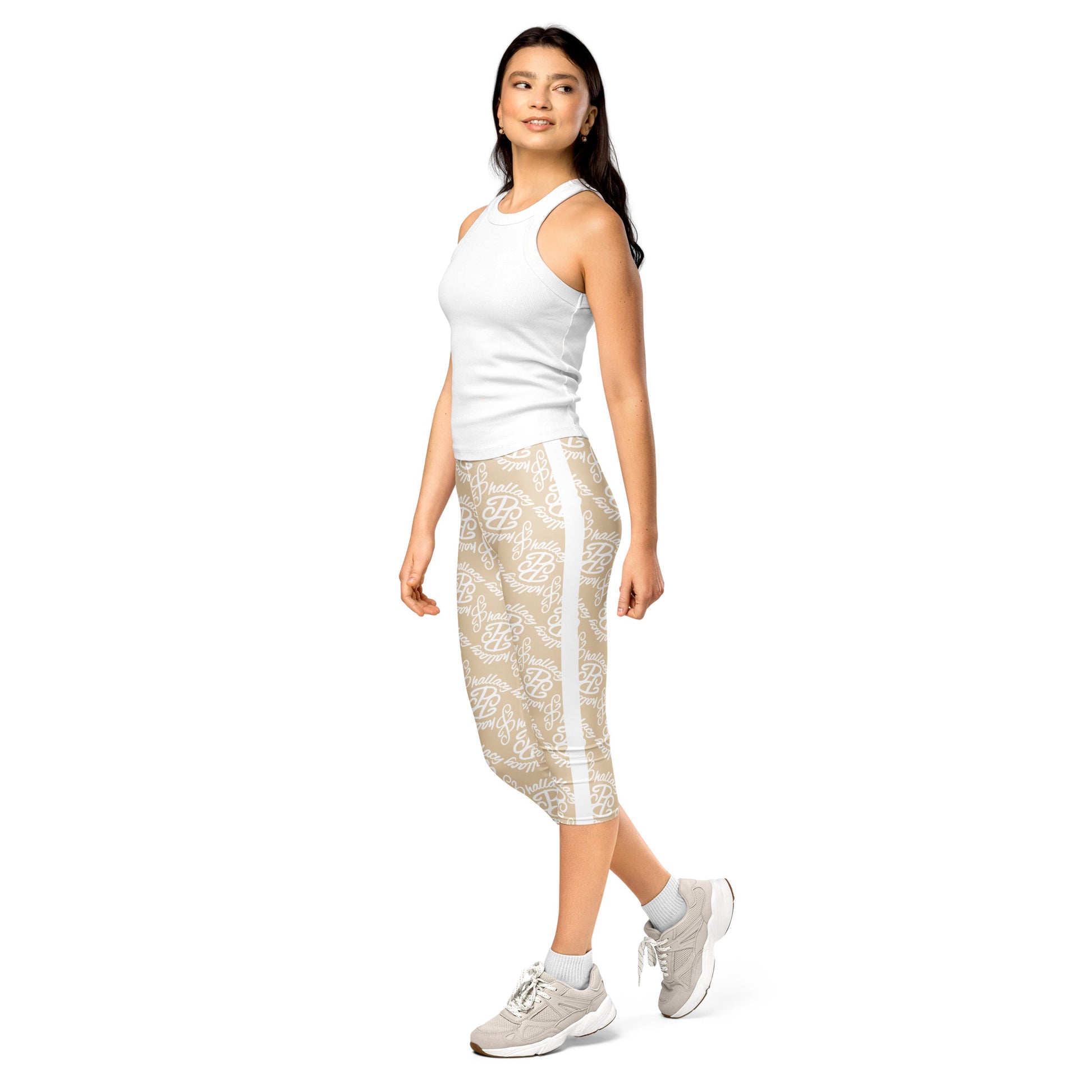 Stylish designer monogram capri leggings in beige, perfect for athleisure and casual wear.